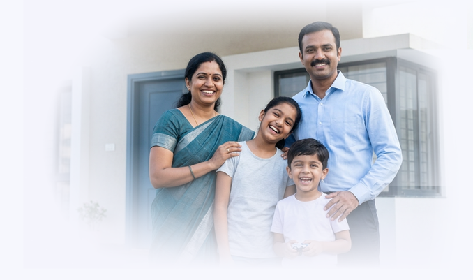 Couple smiling with their two kids