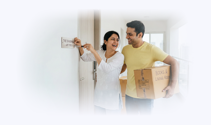 Couple fixing home name plate
